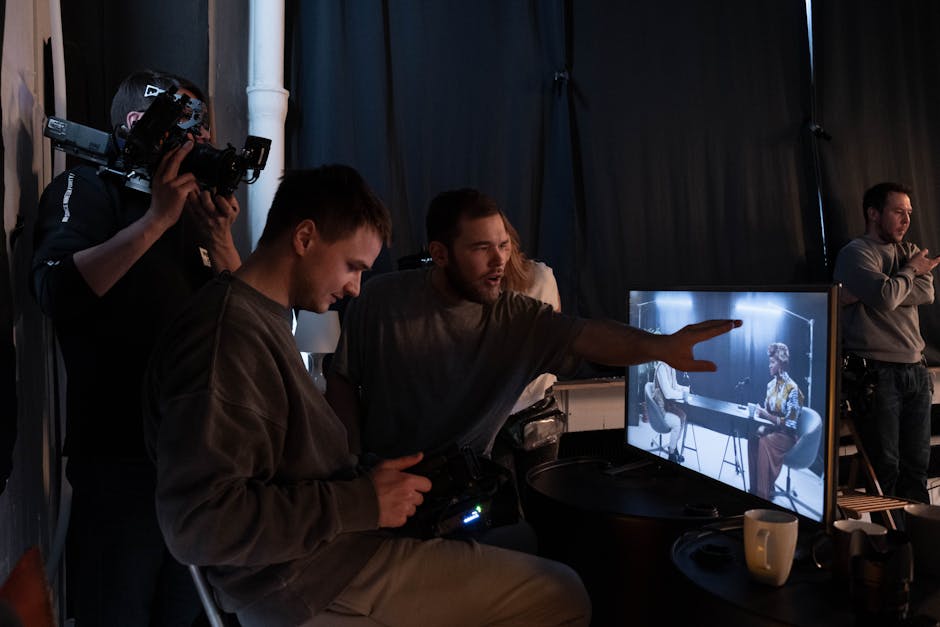 A glimpse into studio recording with crew working and monitoring screens.